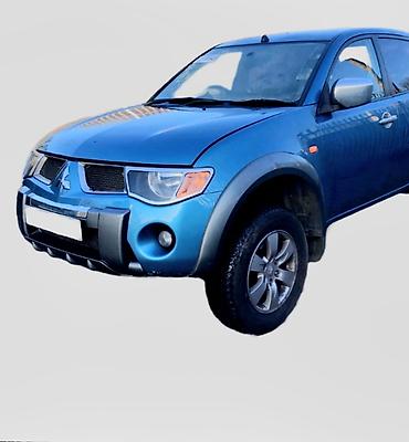 bufer: Ön, Mitsubishi L200 — 1