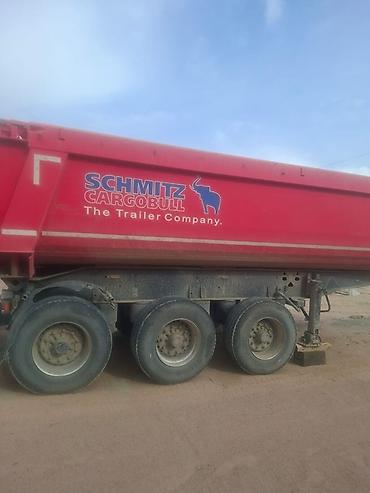 Коммерческий транспорт: Самосвальный полуприцеп Schmitz Cargobull. Трёхосный полуприцеп в — 1