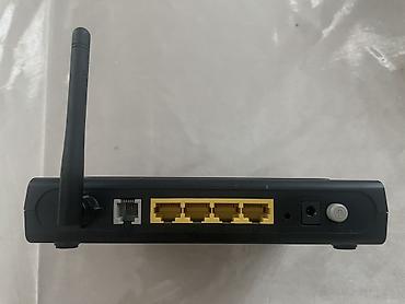 adaptör: D-Link DSL-2640U ADSL2+ Wi-Fi modemi satılır. Tam işlək vəziyyətdədir — 2