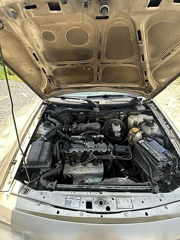 Opel: Model: daevoo Espero Rəng: qızılı/şampan Kuzov: 4 qapı, geniş salon — 5