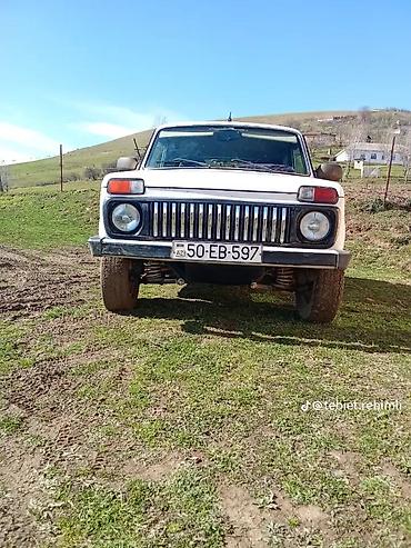niva barter: LADA Niva 4x4, ağ rəngli off-road SUV Xüsusiyyətlər: - Tam ötürücü — 2