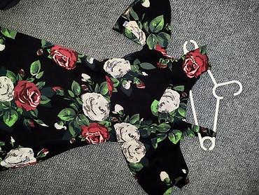 ara torbe: Ženska midi haljina s floralnim printom - Model: kroj u obliku slova — 6
