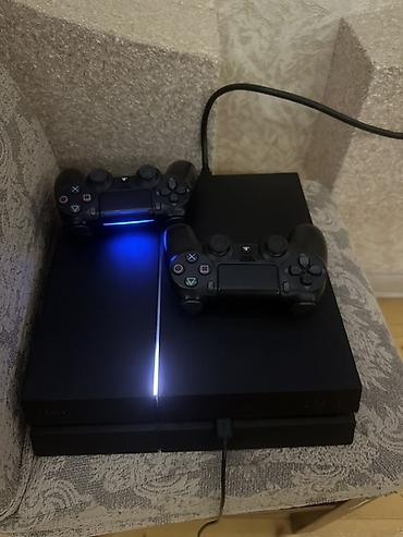 PS4 (Sony Playstation 4): PlayStation 4 (PS4) konsolu – DualShock 4 gamepadlarla Xüsusiyyətlər — 1
