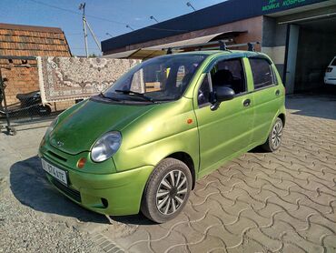 мини электромобиль: Хэтчбек Daewoo Matiz компактного размера в салатовом цвете. Оснащен