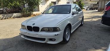 bmw e39 qapı: BMW 5 Series E39 sedan – ağ rəng Xüsusiyyətlər: - Korpus: 4 qapılı — 2