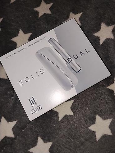 Lil SOLID DUAL (IQOS təqdimatı) – tütün isidən cihaz Qutu tərkibi: -