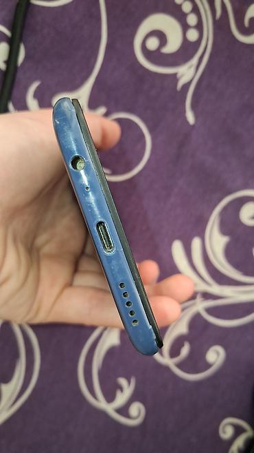 redmi note 9 kabrolari: Xiaomi Mi 9, 64 GB, rəng - Mavi, 
 Barmaq izi — 3