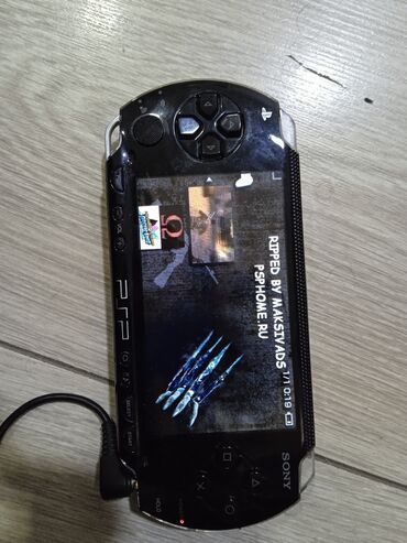 PSP (Sony PlayStation Portable): В комплекте чехол оригинальная зарядка прошитая есть 7 игр