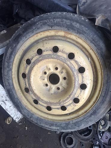 Докатка (запасное компактное колесо) Bridgestone T135/70D17 104M на