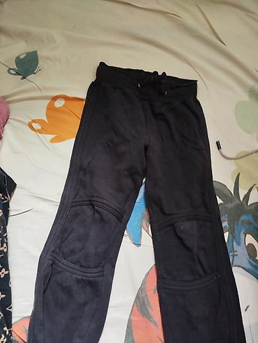 Джинсы: Джинсы классического кроя из плотного денима темно‑синего цвета. - — 13