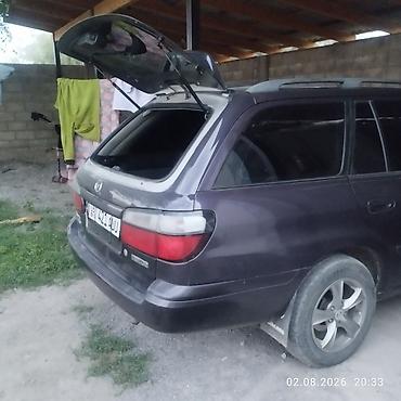 mazda атенза: Mazda Familia: 1998 г., 1.8 л, Механика, Газ, Универсал — 7