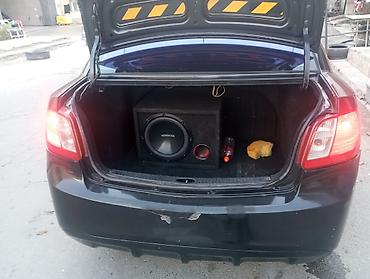 yan güzgülər s: Kia Rio: 1.4 l | 2010 il Sedan — 3