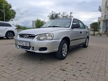 kia clarus 1997: Hyundai Accent: 1.5 l | Sedan — 5