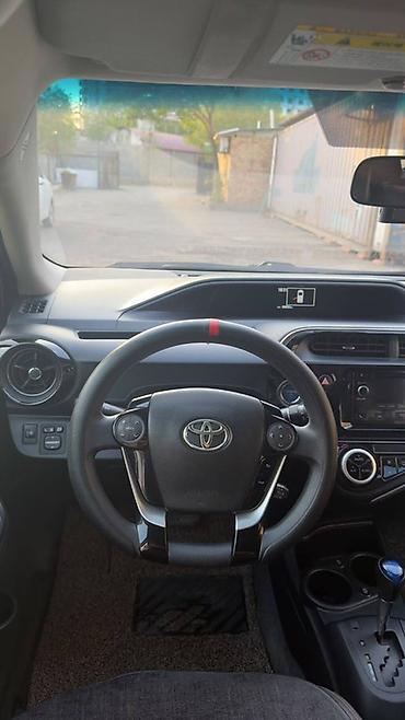 roewe er6: Toyota Prius C: 2018 г., Вариатор, Гибрид, Хэтчбэк — 9