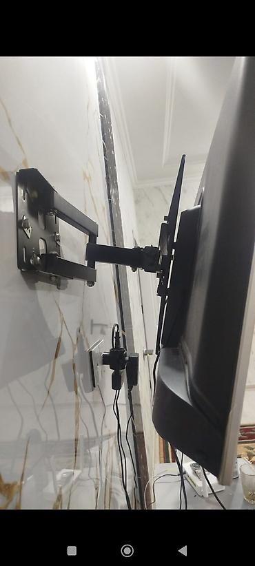 кронштейн для тв: Döndərilə bilən divar asqısı ilə LCD/LED televizor - Müxtəlif ölçülü — 1