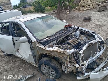 авто фольксваген поло: Ağ rəngli, 4 qapılı BYD F3 avtomobili satılır. Avtomobilin ön hissəsi