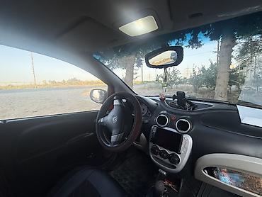 mini karavan: Şəhər üçün kompakt hetçbek – qırmızı rəngdə 5 qapılı. Texniki və — 5