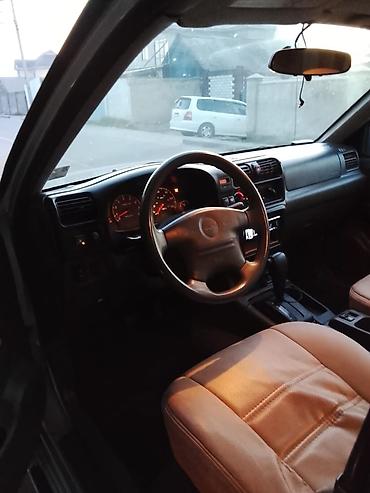 golf 2 8: Isuzu Rodeo: 2002 г., 2.2 л, Автомат, Газ, Внедорожник — 7