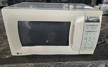 LG mikrodalğalı soba - Rəng: ağ - İdarəetmə: sensorlu panel - Qapı