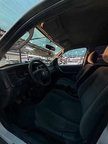 четырка цена: Mazda Tribute: 2004 г., 2 л, Механика, Бензин, Кроссовер — 4