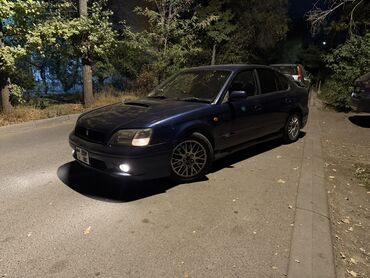 кольца на диски: Subaru Legacy: 2000 г., Седан