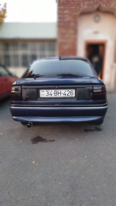 Opel: Opel Vectra A liftback (5 qapı), tünd mavi rəng. Texniki — 7