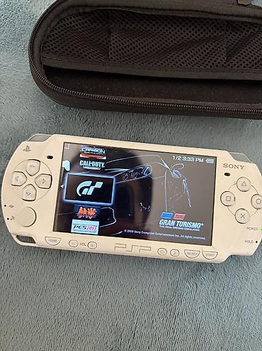 pes 5: Sony PSP-3000, ağ rəng (UMD sürücülü, PSP loqolu arxa qapaq). Portativ — 7