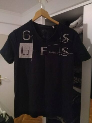 kratke majice i šortsevi za fitnes: Guess, S (EU 36), bоја - Crna
