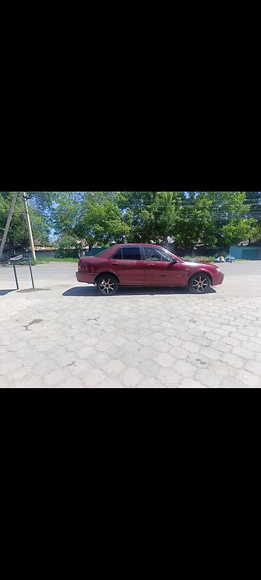 обмен на квартиры: Mazda 323: 2001 г., 1.8 л, Автомат, Бензин, Седан — 7