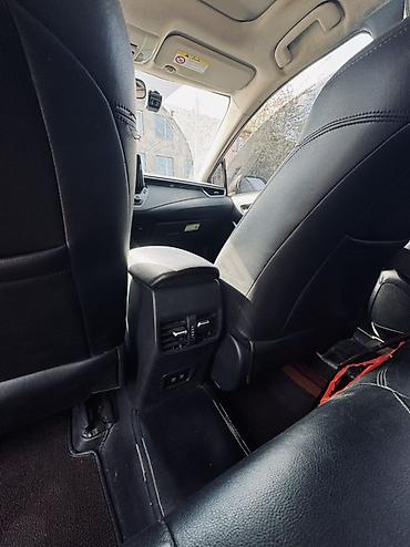 byd e1: Toyota Corolla: 2021 г., 1.8 л, Вариатор, Гибрид, Седан — 10