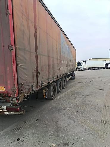 yuk maşnı: DAF XF dartqı (traktor) və tentli qoşqu • Marka/model: DAF XF • — 8