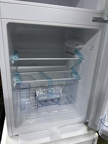 mini refrigerator: Холодильник Новый, Двухкамерный, De frost (капельный), 50 * 85 * 55 — 7
