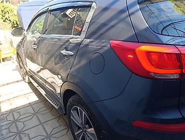 kia cerato manitoru: Kia Sportage (III nəsil) krossover - Kuzov: tünd-boz rəng, 5 qapı - — 3