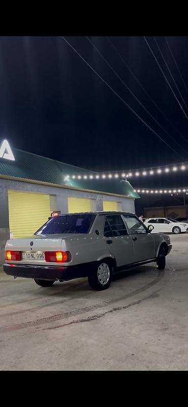 cankan masin: Model: Tofaş Dogan sedan Rəng: Gümüşü/boz, qara bamper və qoruyucu — 1