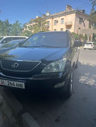 шины на одисей: Черный кроссовер Lexus RX 330 с характерной радиаторной решеткой и