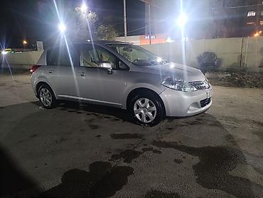 su satan yerler: Nissan Tiida, 5 qapılı hetçbek, gümüşü rəng. - Sərfəli şəhər — 4