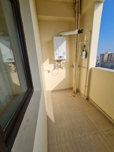 Uzunmüddətli kirayə mənzillər: Memar Əcəmi metrosunun üsdündə 14 mərtəbəli binanın 12-ci mərtəbəsində — 13