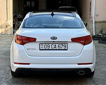 Kia: Kia Optima – ağ rəngli sedan Xarici xüsusiyyətlər: - Şık ağ kuzov — 6
