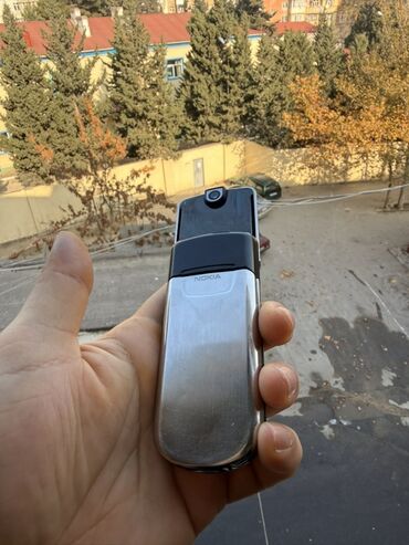 Nokia: Nokia 1, rəng - Gümüşü, Düyməli — 1