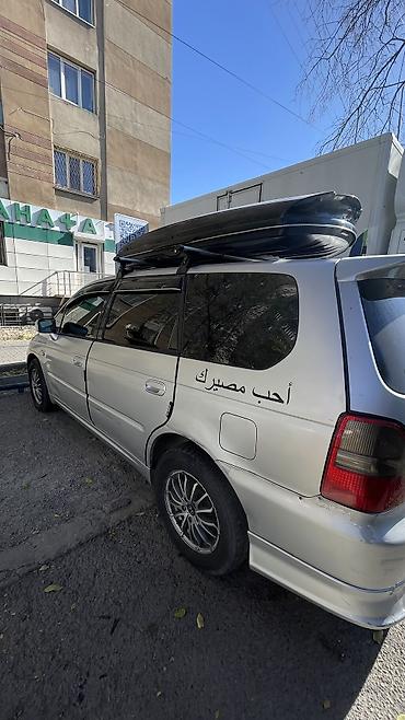 задний дворник на одиссей: Honda Odyssey: 1999 г., 2.3 л, Автомат, Газ, Универсал — 8