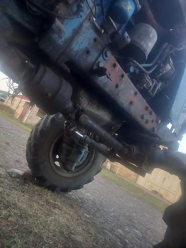 niva siti satilir: Traktor MTZ (Belarus) tipli, 4x4 tam ötürücülü. Mavi rəngli kabinli — 3