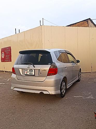 голф 2салон: Honda Fit: 2003 г., 1.3 л, Вариатор, Бензин, Хэтчбэк — 4