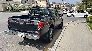 cruze bamper: Mitsubishi L200: 2.5 l | 2008 il 69000 km Pikap — 1