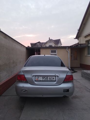 Mitsubishi: Mitsubishi Lancer: 2004 г., 1.6 л, Вариатор, Бензин, Седан