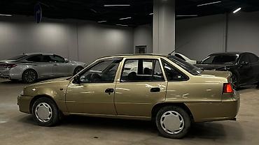 Daewoo: Daewoo Nexia: 2011 г., Бензин — 9