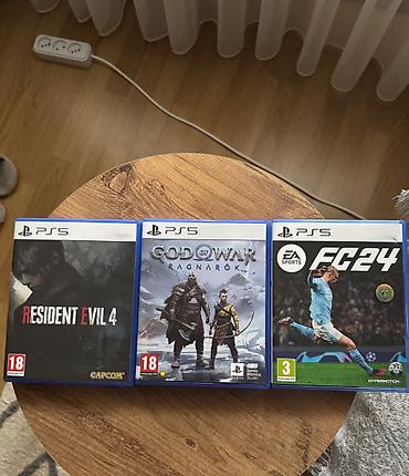 PS5 (Sony PlayStation 5): Ps5 üçün Fc24, God of War və Resident evil 4 Remake. Oyunların hər — 7