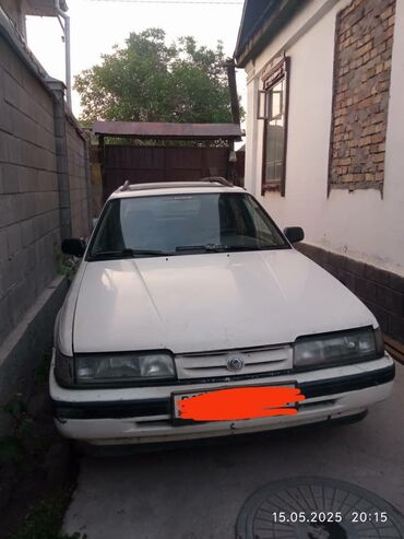 коробка газ: Mazda 626: 1993 г., 2 л, Механика, Бензин, Универсал