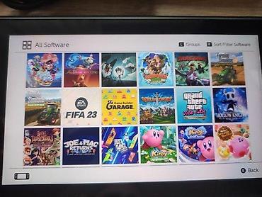 Nintendo Switch: 🔥 JEDINSTVENA PONUDA! Prodajem Nintendo Switch 32GB + microSD 400GB — 10