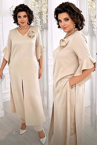Kompleti: Komplet, haljina+pantalone
Cena 2900
Uni vel.
V23 — 1