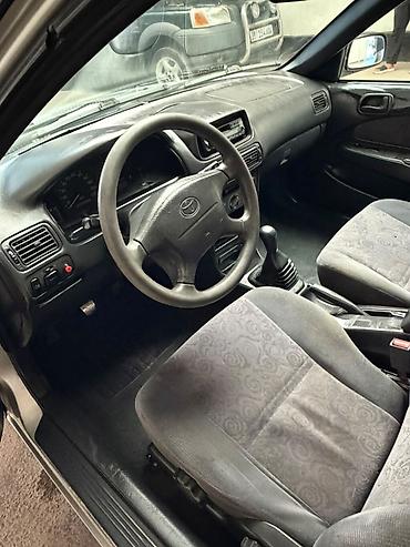 тесла модел 3: Toyota Corolla: 1999 г., 1.4 л, Механика, Бензин, Хэтчбэк — 5